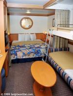 ID 2849 DISNEY WONDER (1999/83308grt/IMO 9126819) - An internal double cabin with two bunk beds.